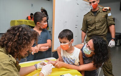Tyrimas rodo, kad 11% Izraelio vaikų, užsikrėtusių virusu, kenčia nuo „ilgai trunkančio COVIDO“
